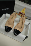 CHANEL Beige and Black Cap-Toe Slingback Flats