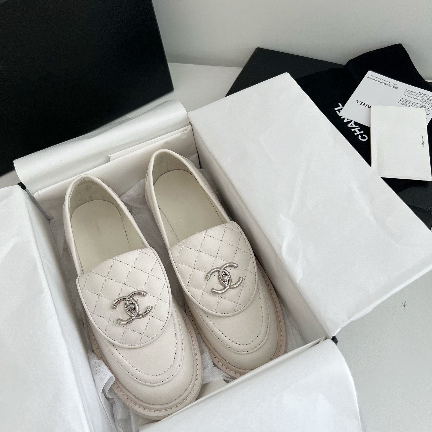 CHANEL Moasins White Quilted Calfskin Silver